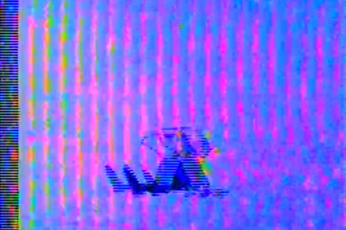 A solitary cartoon figure sitting with its head looking up as if they just fell, evoking a sense of loneliness. The figure is set against a backdrop of vertical, colorful lines with a heavy glitch effect, creating a distorted, digital atmosphere.